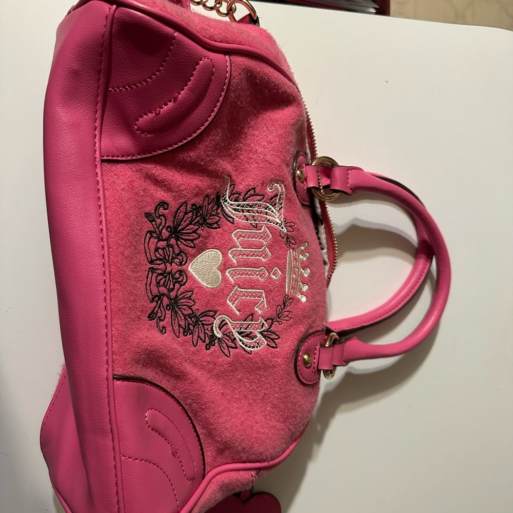Juicy Couture Pink Shoulder Bag with Ornate Emblem